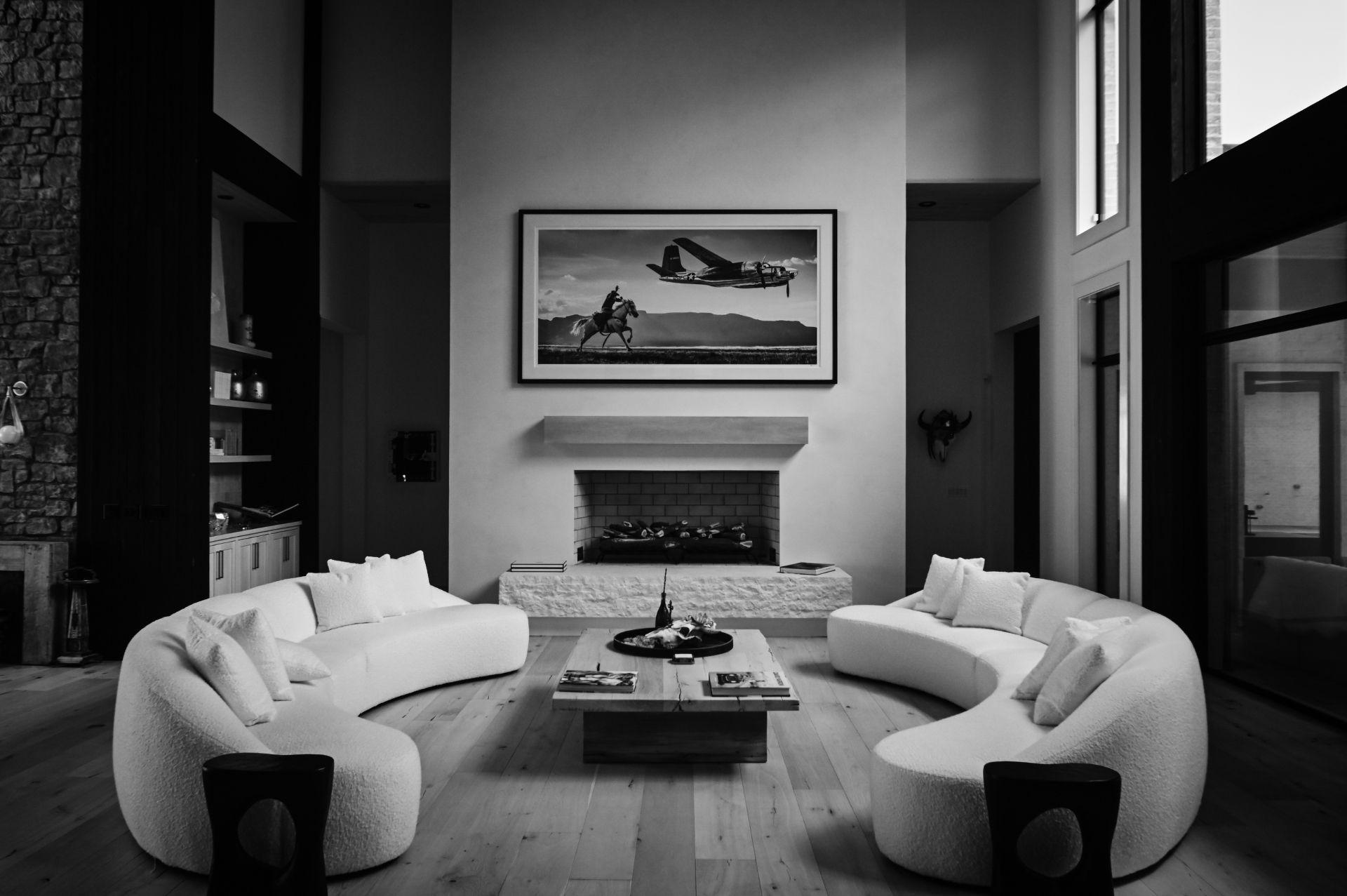 Monochrome infrared interior of a modern living room with a framed photograph above a fireplace — Nikon Z7II, 720nm